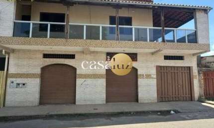 Casa com duas lojas localizada no bairro Serra Azul/Sarzedo