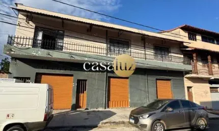 Casa com 2 lojas mais 3 barracões localizada no bairro Industrial /Contagem