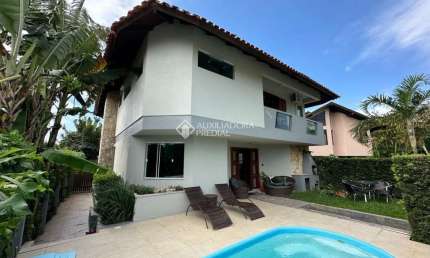 Casa com 3 quartos para alugar na Rua dos Amborés, 206, Jurerê Internacional, Florianópolis, 288 m2 por R$ 18.000