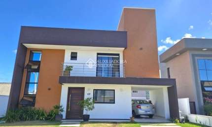 Casa em condomínio fechado com 3 quartos para alugar na Avenida Red Park, 784, São João do Rio Vermelho, Florianópolis, 170 m2 por R$ 8.000