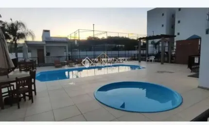 Apartamento com 2 quartos para alugar na Rua Pedro Thiesen Júnior, 343, Ponte do Imaruim, Palhoça, 54 m2 por R$ 1.750