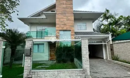 Casa em condomínio fechado com 5 quartos para alugar na rua das avencas, 142, pedra branca, palhoça, 386 m2 por r$ 11.500