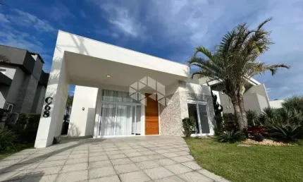 Casa à venda, com 4 quartos/dormitórios, e 2 vagas/box no condomínio Enseada, Xangri-Lá/RS
