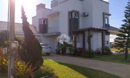 Casa á venda com 4 quartosdormitórios 3 vagasbox no condomínio Lagoa do Passo, OsorioRS
