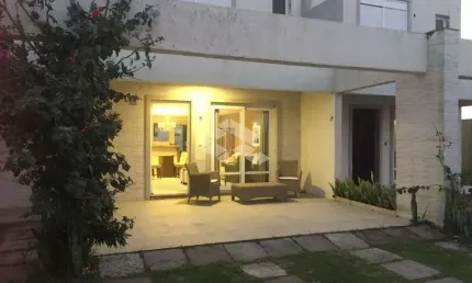 Casa  3 dormitórios 1 suíte no Pateo Marbella em Xangri-lá/RS