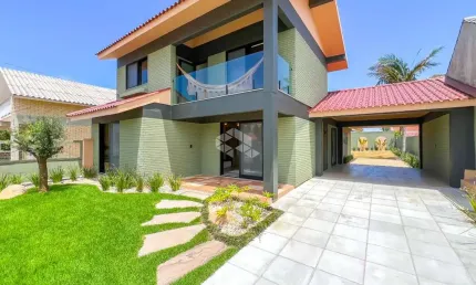 Casa/sobrado 4 dormitórios com garagem para 02 carros em atlântida - xangri-lá/rs