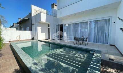 Casa em Condomínio à venda no Blue, Xangri-Lá, com 4 suítes, 277m² e alto padrão de acabamento