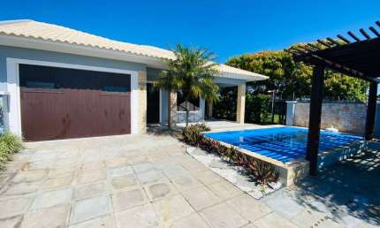 Casa 4 dormitórios, 3 suítes, amplo living,, piscina, varanda, Centro - Xangri-lá