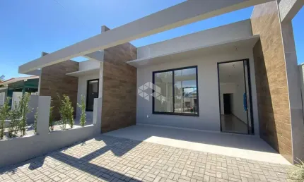Casa geminada à venda no centro de xangri-lá - 3 dormitórios, 110m², pé direito alto