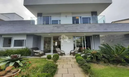 Casa com 5 suítes em atlântida, quase divisa com capão da canoa/rs.