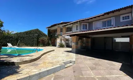 Casa 4 dormitórios, 1 suíte, com piscina em Atlântida - Xangri-lá