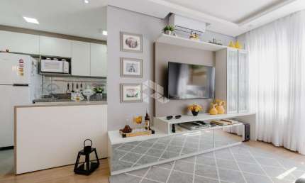 Apartamento semi-mobiliado de 64 m², 2 dormitórios sendo 1 suíte, 1 vaga.