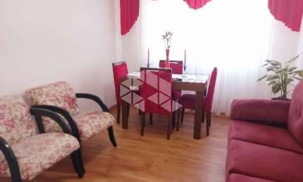 Apartamento semimobiliado com 3 dormitórios, uma suíte, living para dois ambientes,