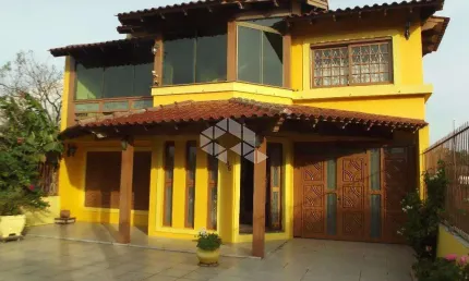 Casa com 4 quartos à venda na Rua Marquês do Maricá, 505, Vila Nova, Porto Alegre