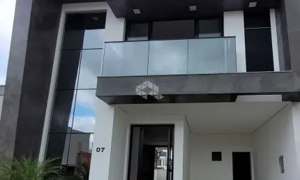 CASA DE 3 DORMITÓRIOS C/01 SUITE EM CONDOMINIO FECHADO