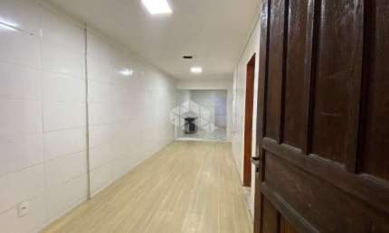 Terreno com 3 casas e 1 quitinete no bairro Serraria, em São José- SC