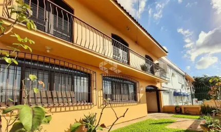 CASA COM ACESSIBILIDADE DE 4 DORMITÓRIOS 4 VAGAS NO PARTENON