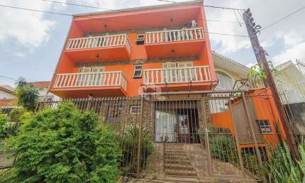 Casa 4 dorms à venda Rua Doutor Barbosa Gonçalves, Chácara das Pedras - Porto Alegre