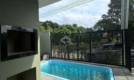 Casa sobrado três quartos  com piscina em Mariscal Bombinhas SC