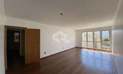Apartamento à venda com 02 dormitórios, suíte e sacada no Centro de Santa Maria, RS.