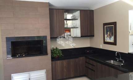 Casa de 3 dormitórios à venda com suíte no Bairro Tomazetti