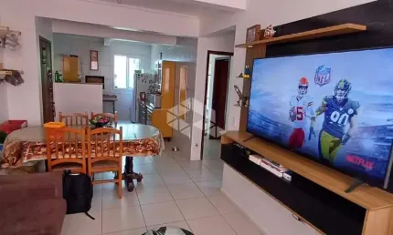 Apartamento com 2 quartos, 1 suíte , 1 banheiro social e garagem.