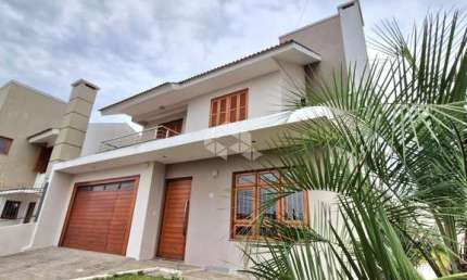 Casa com 3 quartos, sendo uma suíte, à venda no Bairro Camobi, Santa Maria.