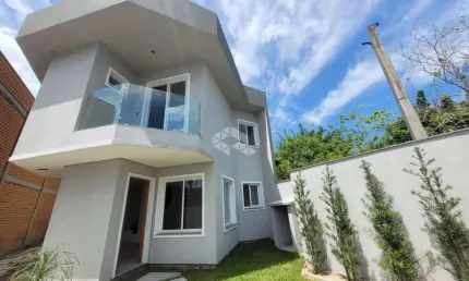 Casa em condomínio fechado com 3 quartos à venda na Rua Buttenbender, 296, Fátima, Canoas