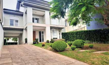 CASA SOBRADO ALTO PADRÃO, 4 DORMITÓRIOS, 3 SUÍTES, BAIRRO BELA VISTA EM CANOAS.