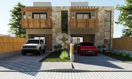 Sobrado com 3  dormitórios, sendo um suíte, garagem próximo ao mar