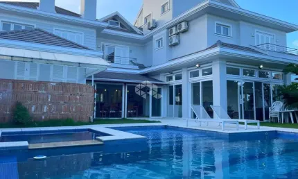 CASA EM CONDOMÍNIO ALTO PADRÃO, 4 DORMITÓRIOS, 3 SUÍTES E 4 BOX!
