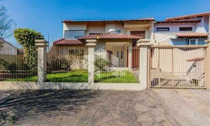 Casa com 4 dormitórios,  2 vagas, bairro Bela Vista, Canoas