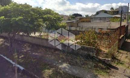 Terreno de esquina de 330m², 10x30 de dimensão. À venda no bairro Nossa Senhora das Graças, próximo à BR116. Aceita financiamento FGTS