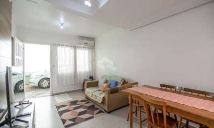 Casa condominio, 58,13 m² de área privadas, 2 dormitórios, living com 3 ambientes, sala de estar, jantar e cozinha, 1 vaga de garagem