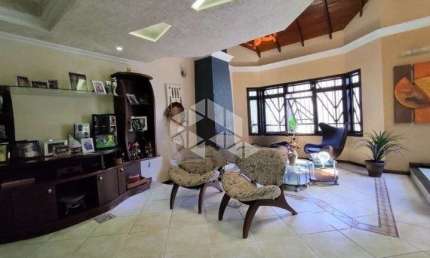 Casa-Sobrado a venda no bairro Fátima/Canoas, com piscina, 3 dormitórios,3 vagas de garagem, Patio e churrasqueira.Aceita Financiamento e avalia Dação