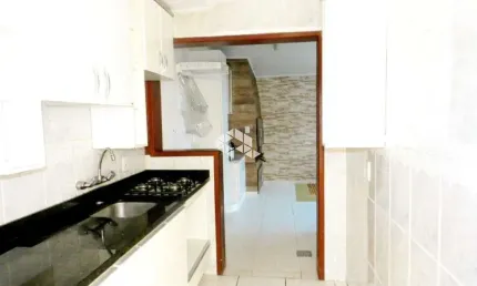 Casa em Condomínio 3 dormitórios, semimobiliado, 1 vaga de garagem, Marechal Rondon, próximo ao parkshopping Canoas, aceita financiamento e FGTS.