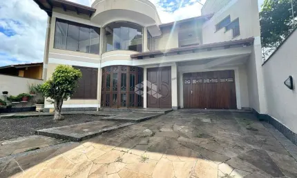 Casa com 3 Dormitórios, 1 suíte master, piscina, área gourmet, no Bairro Estância Velha, na cidade de Canoas. Aceita Financiamento Bancário e FGTS.