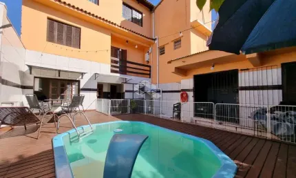 Casa 6 dormitórios, 1 suíte com hidromassagem, salão de festas com churrasqueira, estância velha/canoas. próximo parkshopping. aceita imóvel