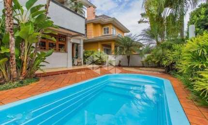 CASA EM CONDOMÍNIO ALTO PADRÃO, 5 DORMITÓRIOS, 3 SUÍTES E 4 BOX!