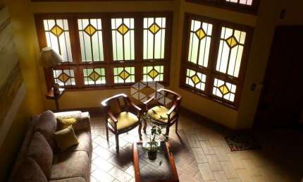 Casa com 4 quartos à venda na Oduvaldo Viana Filho, 311, Marechal Rondon, Canoas