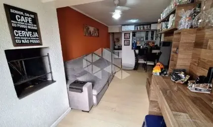 Apartamento com  03 quartos, sendo 01 suíte, 01 vaga coberta, sacada fechada com churrasqueira, no centro de canoas.