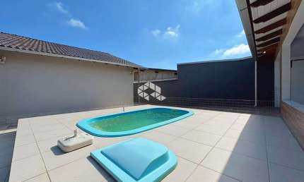 Casa com 3 dormitórios, mobiliada, com Piscina, Bairro Nossa Senhora das Graças, em Canoas/RS. Estuda proposta e aceita Financiamento bancário