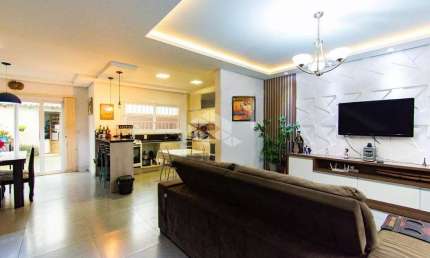 Casa sobrado, com 3 dormitórios, sendo uma suíte, vaga para 2 veículos, no Bairro Igara, na Cidade de Canoas. Aceira Financiamento Bancário