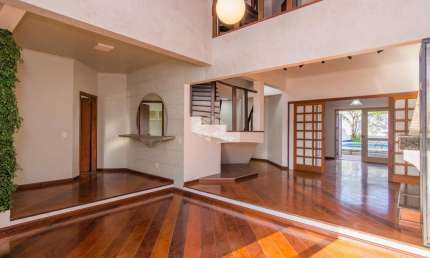 Casa 4 dormitórios, 4 suítes e com sacada, aceita financiamento no Bairro Jardim do Lago.