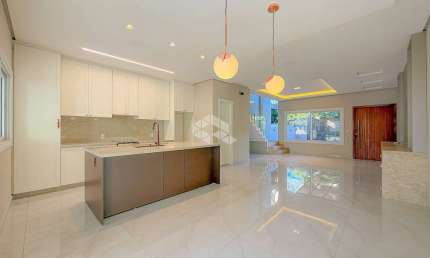 Casa semimobiliada à venda no bairro Bela Vista em Canoas - 3 dormitórios, suíte, pátio e espaço gourmet - Aceita financiamento e FGTS