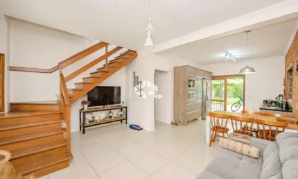 Casa à venda no Bairro Bela Vista em Canoas - 4 dormitórios, suíte máster, área gourmet, pátio amplo e 3 vagas - Aceita financiamento e FGTS