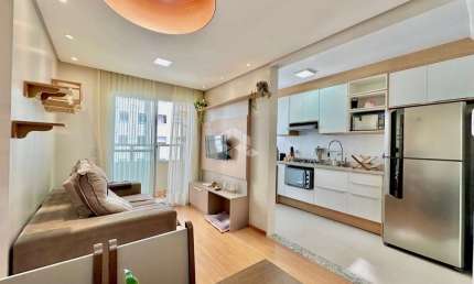 Apartamento 2 dormitórios no bairro Vila Rosa, em Novo Hamburgo, sacada com churrasqueira, vaga