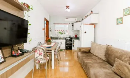 Casa 2 dormitórios, bairro São José, Canoas - 77m² privativos, semimobiliada, com placas solares, 2 vagas de garagem | Aceita financiamento e FGTS