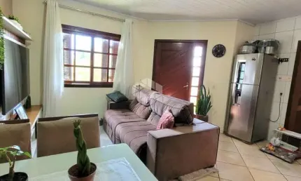 Casa à venda no Bairro Olaria em Canoas - 2 dormitórios, 3 vagas, com financiamento e uso de FGTS