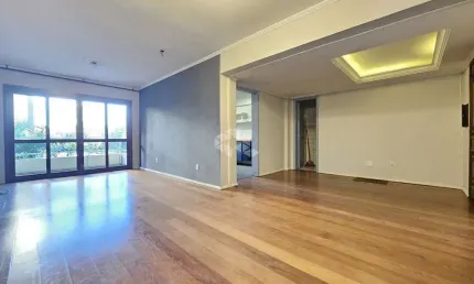 Apartamento de 141m² à venda no Centro de Canoas RS - 3 dormitórios, suíte, sacada, área gourmet e vaga de garagem coberta.